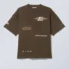 Boxy Printed Graphic T-Shirt – Dark Brown – Sports Logos