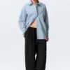 Cross-Buttoned Long-Sleeved Cotton Shirt – Light Blue