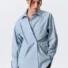 Cross-Buttoned Long-Sleeved Cotton Shirt – Light Blue