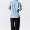 Cross-Buttoned Long-Sleeved Cotton Shirt – Light Blue