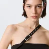 Faustina C One-Shoulder Buckle Suiting Top – Black