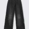 Mid-Rise Baggy Studded Graphic Sweatpants – Studded Black