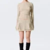 Studded Pleated Mini Skirt – Beige