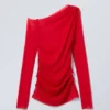 Transparent Drape Asymmetric Long Sleeve – Red